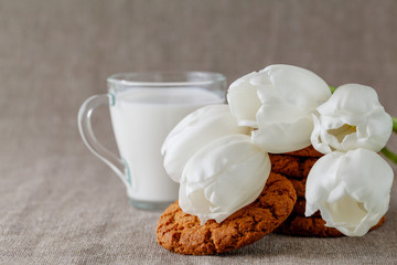 Muesli cookies and glass of milk