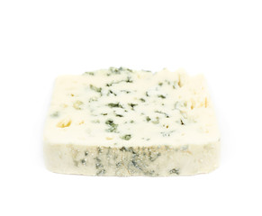 Slice of a blue roquefort cheese isolated