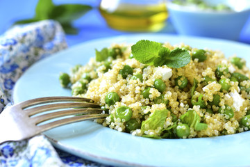Quinoa salad with green pea,feta and mint.