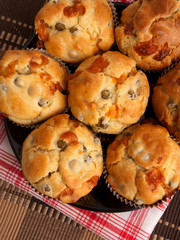 Savory muffins with ham, cheese and boiled eggs. Shot from above, vertical shot