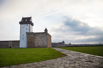 Fototapeta na wymiar Hermann castle (Hermanni linnus) is a medieval castle in the Estonian town of Narva on the river Narva (Narova), founded in the XIII century. Historical Narva castle of middle ages. Place for travel.