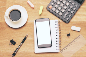 White smartphone and calculator