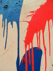 Deposits of paint on the wall of building