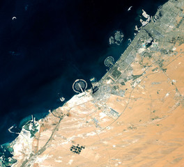 Dubai from Landsat satellite. Elements of this image furnished by NASA. - obrazy, fototapety, plakaty