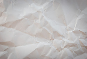 White crumpled paper background texture with vignette