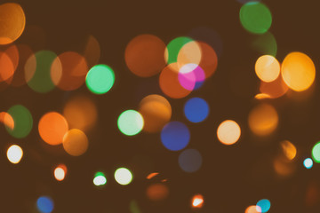 Vintage retro blur bokeh light. Film look abstract background.