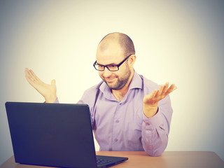 businessman bald with beard wearing shirt and glasses