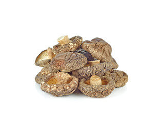 dried shiitake mushrooms on white background