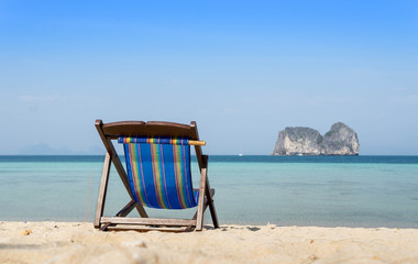 beach chair on sand and sea view