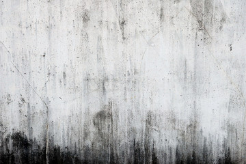 汚れたコンクリートの白い壁