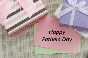 Gift boxes with Happy Father's Day words on paper