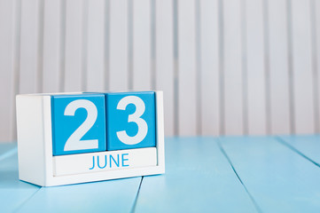June 23rd. Image of june 23 wooden color calendar on white background. Summer day. Empty space for text. International Olympic Day