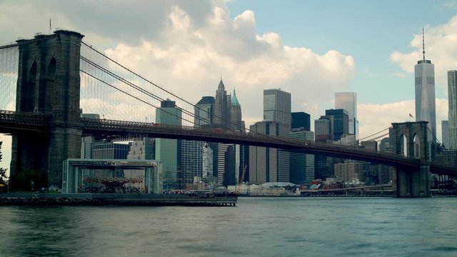 cloudy day manhattan view through brooklyn bridge 4k time lapse new york usa

