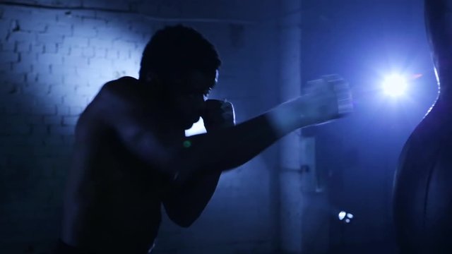 African american boxer athlete shadow boxing