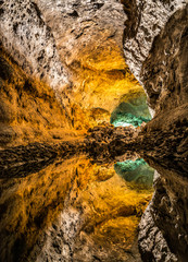 Optical illusion - water reflection in Cueva de los Verdes, an amazing lava tube and tourist...