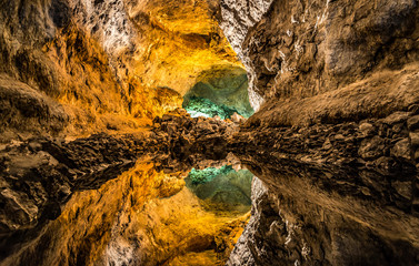 Optical illusion - water reflection in Cueva de los Verdes, an amazing lava tube and tourist...