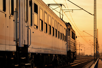 Train in the setting sun © Tomasz Warszewski