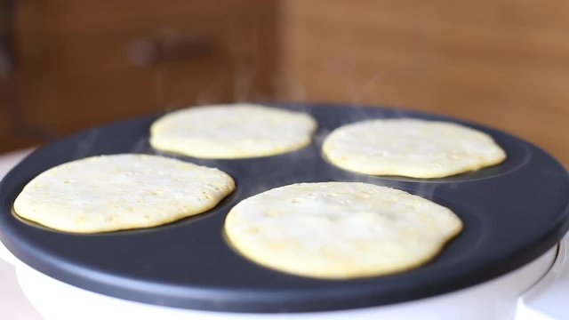 Making Pumpkin Pancakes on Frying Pan. Homemade Griddle Cakes. HD, 1920x1080.