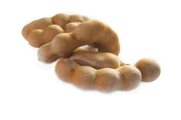 brown tamarind on white background for food ingredient
