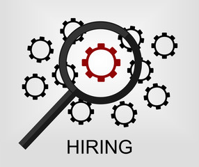 a magnifying glass hovering over a red nut