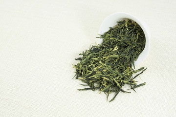 Tea (Sencha) on white background.
