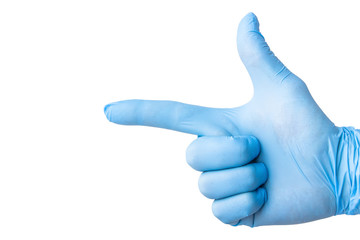 Hand finger pointing arrow in blue medical glove.