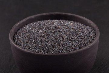 poppy seeds in a stone bowl