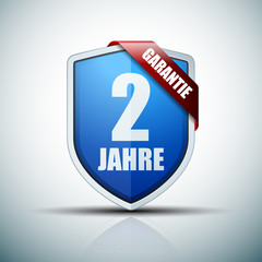 2 Year Warranty shield (non-English text - 2 Year Warranty)