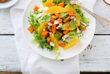 fresh salad with pumpkin and oranges