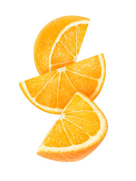 Isolated falling slices of orange