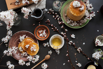 top view of decorated table with pancakes