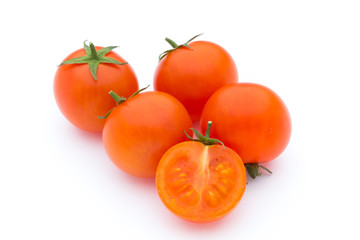 Tomato on the white isolatd background.