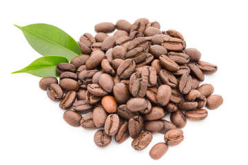 Coffee grains and leaves isolated on the white backgrounds.