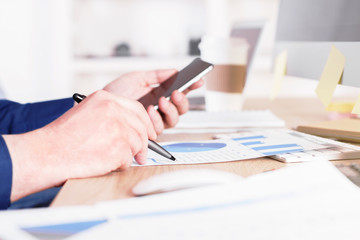 Businessman using cellphone