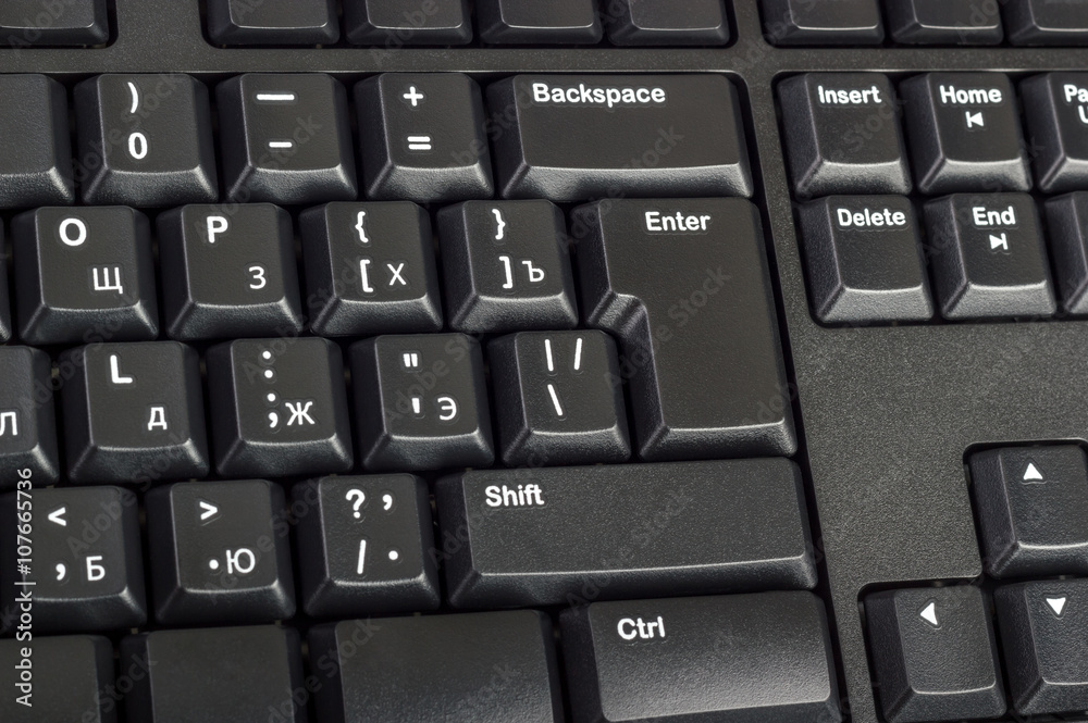 Fototapete Electronic collection - black computer keyboard with key enter