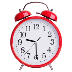 Alarm clock shows half past nine