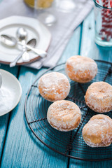 Homemade fresh donuts on cooling tray
