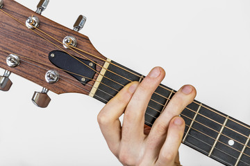 detail of fingers and hand of guitar player