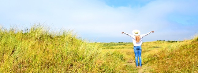 happy woman raising hands