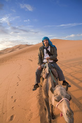 Naklejka premium Riding my camel