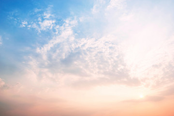 Obraz premium Sky blue and orange light of the sun through the clouds in the s