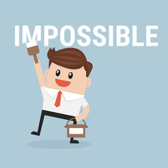Businessman painting the word impossible to possible