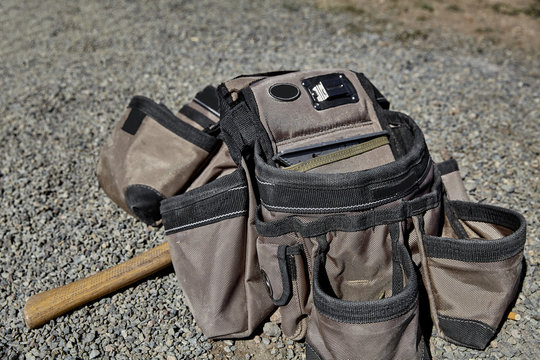 carpenter tool work belt construction closeup