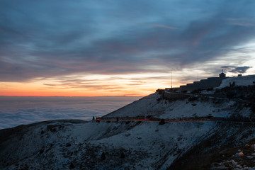 Light trails with building in background..