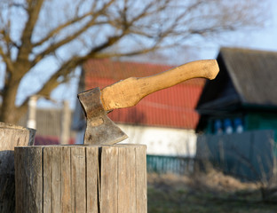 Axe in a log