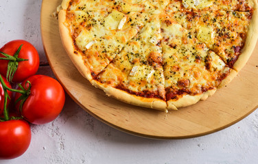 Delicious pizza with cheese.