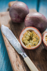 Passion fruit on wooden board.