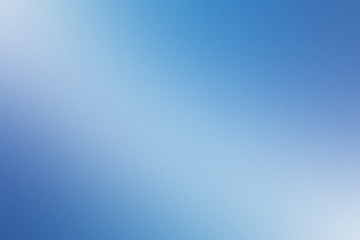 abstract blue background or dark paper with bright center spotli