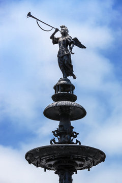 sculpture on the historic fountain