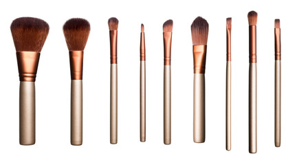 Set of brown soft cosmetic brushes isolated over white